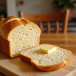 Freshly baked bread from a bread machine, perfect for a simple weeknight dinner.