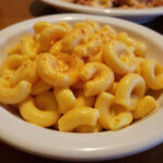 Classic Cracker Barrel Macaroni and Cheese served, showcasing its creamy texture and baked perfection.