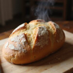 Homemade batard bread, perfect for a beginner's bread recipe.