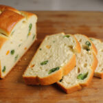 Freshly baked and sliced Effortless Cabbage Bread, packed with flavor.