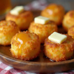 Southern-Style Honey Butter Cornbread Poppers drizzled with honey and butter, ready to serve.