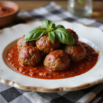 Finished 4C bread crumbs meatballs served with marinara sauce.