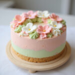 Finished ultimate bento cake with pastel frosting and sugar decorations.