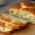 Freshly baked cabbage bread with savory cabbage filling, ready to eat.