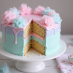 Finished cotton candy cake with frosting and cotton candy decorations.