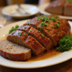 Deliciously sliced Lipton onion soup meatloaf ready to serve.