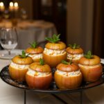 Gorgeous presentation of Cheesecake Stuffed Baked Apples served with caramel drizzle, perfect for dessert lovers.