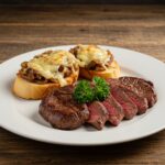 Delicious Steak & French Onion Bruschetta, perfect for gatherings, showcasing the savory flavors and beautiful presentation.