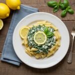 Deliciously plated Zesty Lemon Ricotta and Spinach Pasta, showcasing vibrant colors and garnishes, perfect for a delightful meal.