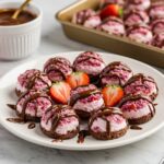 Delicious chocolate strawberry yogurt clusters served on a plate, showcasing the perfect dessert treat for strawberry and chocolate lovers.