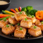 Serving suggestion for crispy air fryer honey garlic salmon bites, showcasing a delicious and healthy dish ready to enjoy.